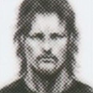 Portrait of a Mother Base recruit with long hair and a heavy mustache