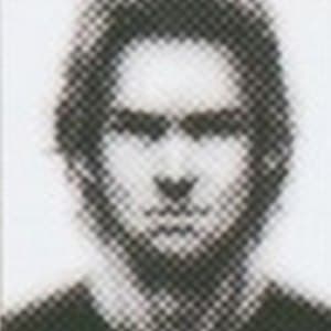 Portrait of a Mother Base recruit with dark hair down over his forehead