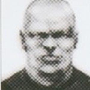 Portrait of a Mother Base recruit with a receding hairline and a mustache